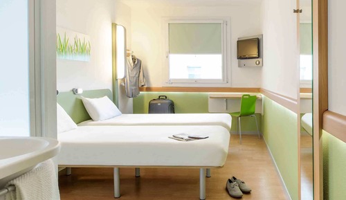 Habitación triple, varias camas