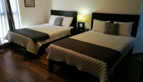 Habitación cuádruple económica, varias camas