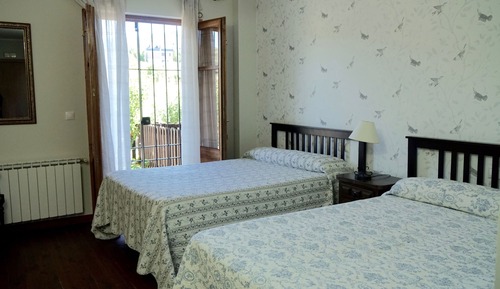 Habitación superior con 1 cama doble o 2 individuales