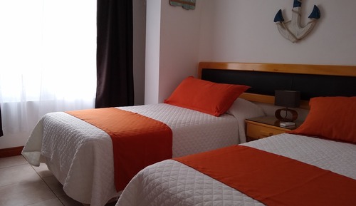 Habitación estándar con 1 cama doble o 2 individuales, vistas al jardín