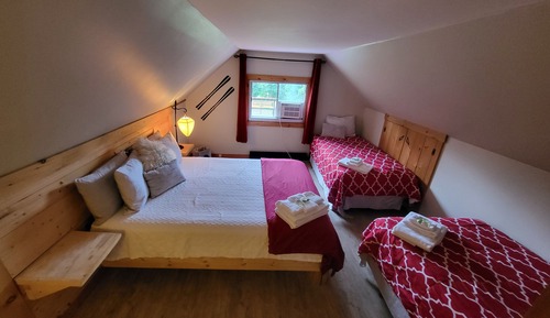 Habitación triple Deluxe, varias camas, no fumadores, vistas al jardín