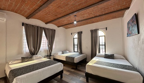 Habitación familiar, varias camas