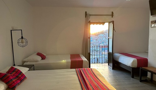 Habitación familiar, varias camas