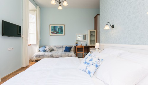Habitación triple, vistas al mar