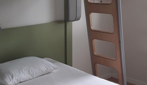 Habitación triple, varias camas