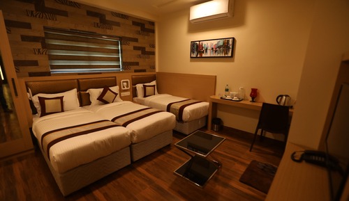 Habitación triple Deluxe