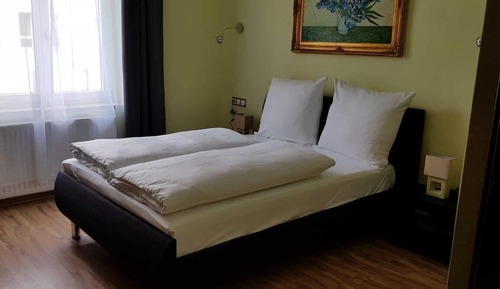 Habitación Confort con 1 cama doble o 2 individuales