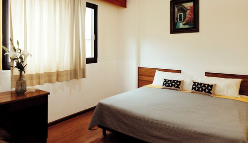 Habitación comfort con cama King, sin aire acondicionado