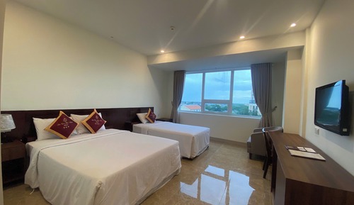Habitación triple Deluxe