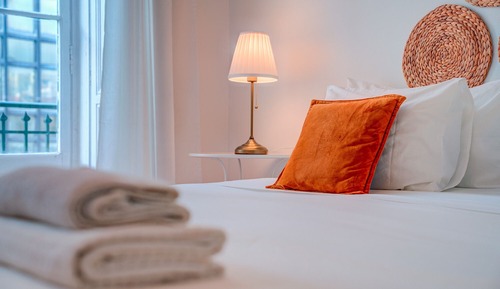 Habitación estándar con 1 cama doble o 2 individuales, baño compartido