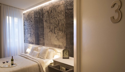 Habitación triple (Arazzi)