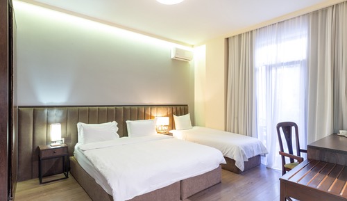 Habitación cuádruple familiar, varias camas, no fumadores, vistas al jardín
