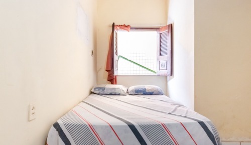 Habitación triple, varias camas