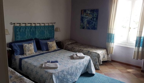 Habitación cuádruple Deluxe