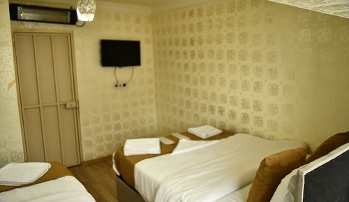 Habitación cuádruple clásica, vistas al jardín