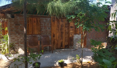 Habitación triple familiar, vistas al jardín