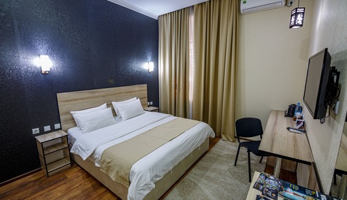 Habitación estándar con 1 cama doble o 2 individuales