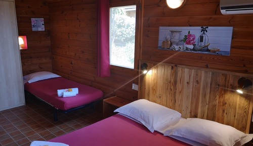 Habitación triple Confort, vistas al jardín