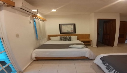 Habitación Deluxe, 2 camas dobles, vistas al jardín