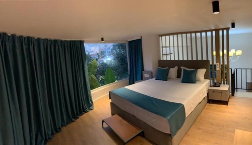 Duplex Suite with Balcony - Ground Floor (no close bedrooms with a door)