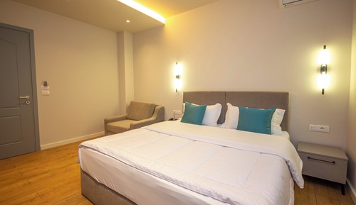 Habitación triple Deluxe, balcón, planta baja
