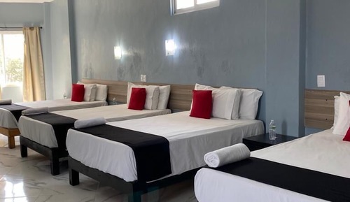 Habitación familiar, varias camas