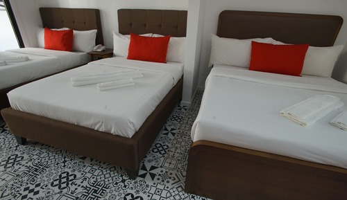 Habitación triple Deluxe, vistas al jardín