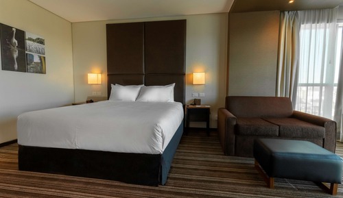 Suite, 1 cama de matrimonio grande, vistas a la ciudad