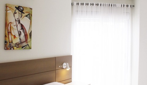 Habitación triple Deluxe