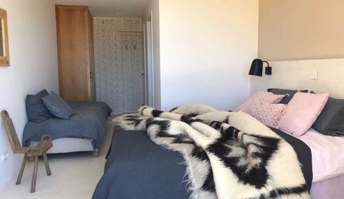 Habitación triple, vistas al mar