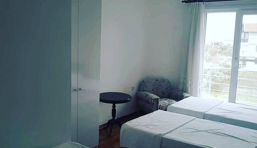 Habitación triple, vistas al mar