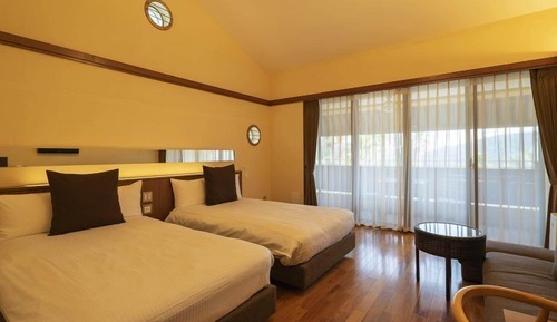 Habitación con 2 camas individuales, en edificio anexo (Villa)