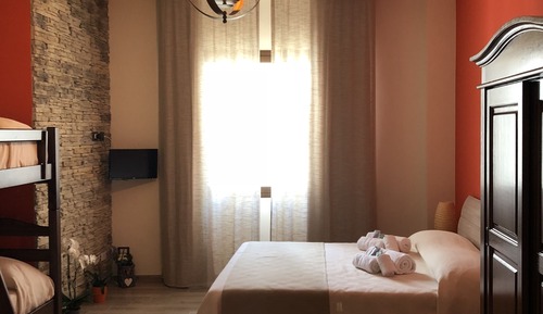 Habitación cuádruple Deluxe