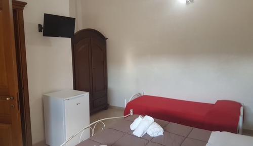 Habitación triple, vistas al jardín