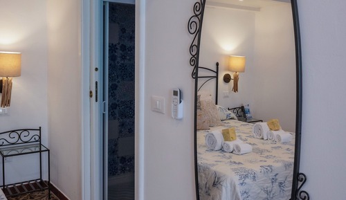 Habitación cuádruple Confort, en la zona del patio