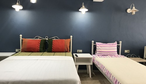 Habitación triple Deluxe, patio, planta baja