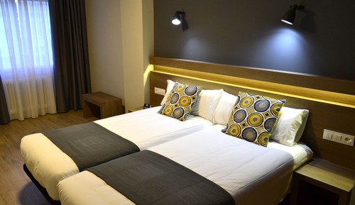Habitación estándar con 1 cama doble o 2 individuales