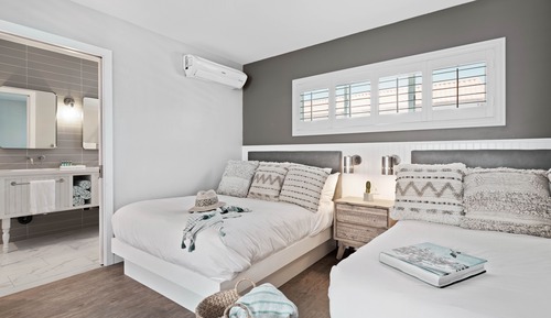 Habitación familiar doble, vistas parciales al mar