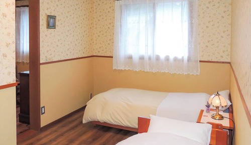 Habitación, baño compartido (Western Triple)