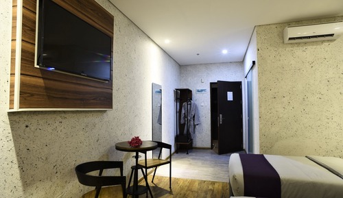Habitación Deluxe con 1 cama doble o 2 individuales, varias camas