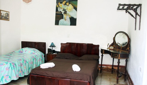 Habitación económica doble, varias camas, vistas al jardín