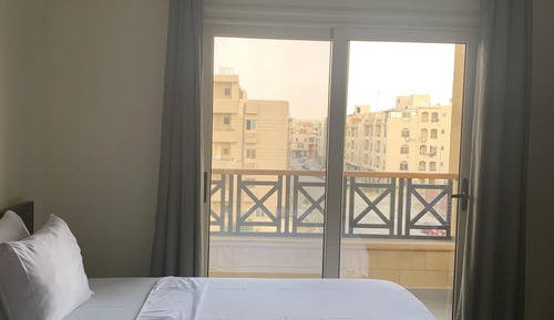 Habitación Deluxe doble, varias camas, vistas a la ciudad