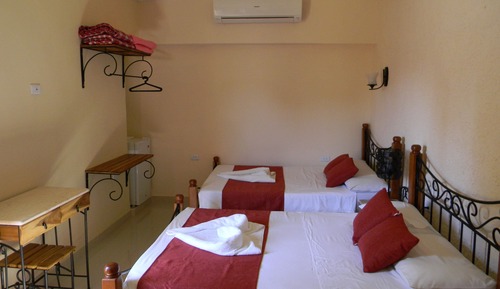 Habitación cuádruple clásica, 2 camas de matrimonio, vistas al jardín