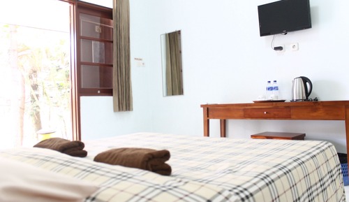 Habitación básica con 1 cama doble o 2 individuales
