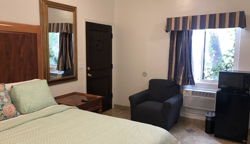 Habitación Deluxe, varias camas, bañera de hidromasaje, en la zona del jardín