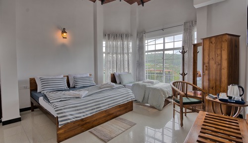 Habitación triple Deluxe, varias camas, no fumadores, vistas a la montaña