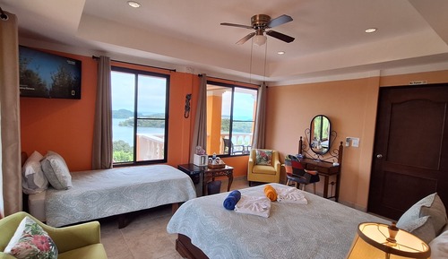 Habitación triple de lujo, varias camas, vistas al mar