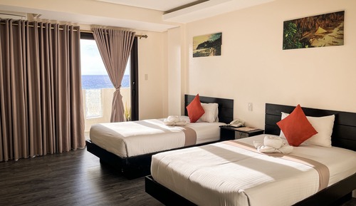 Habitación Deluxe con 1 cama doble o 2 individuales, 2 camas dobles, vistas al mar