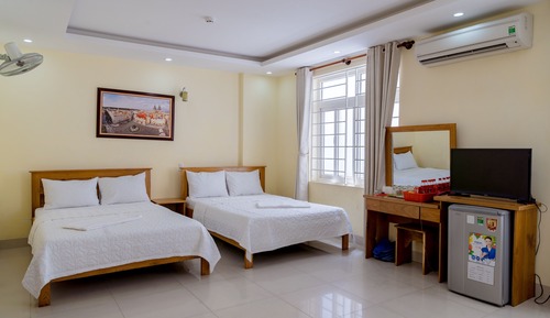 Habitación cuádruple Deluxe