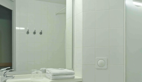 Habitación triple, varias camas